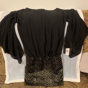 Black & Gold dress with peekaboo shoulders NWT